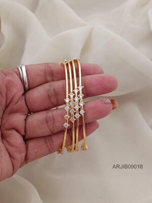 (2.10) Size Gold Finish White Stone Bangles